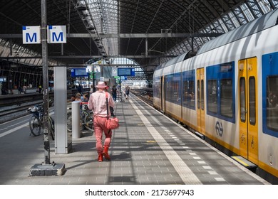 Amsterdam, The Netherlands - 21 June 2022: Nederlandse Spoorwegen Train In Amsterdam Central Station