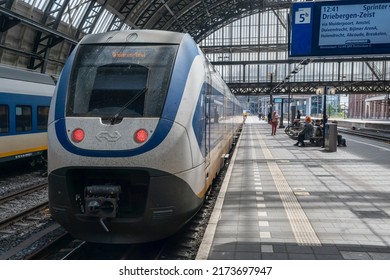 Amsterdam, The Netherlands - 21 June 2022: Nederlandse Spoorwegen Train In Amsterdam Central Station