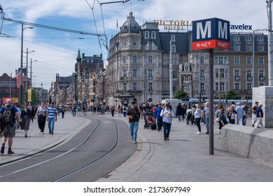 Amsterdam, The Netherlands - 21 June 2022: Many People Walking On Damrak Street