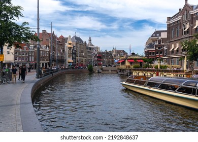 Amsterdam, The Netherlands - 21 June 2022: Tour Boat In Rokin Canal