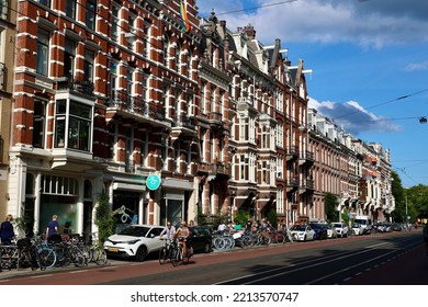 Amsterdam, The Netherlands - 6 August 2022: Everyday Life Of Tourists And Townspeople In Amsterdam, Netherlands. Typical Street View In Amsterdam, Holland.