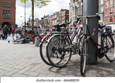 Amsterdam, Netherlands - April, 23, 2017: Bikes on the street of Amsterdam in 2017