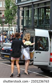 Amsterdam, Netherlands - August 25th 2012:Wedding Flower Delivery For The Wedding Near West Church (Westerkerk) In Amsterdam. 