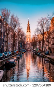 Amsterdam Netherlands  Beautiful Groenburgwal canal in Amsterdam with the Soutern church (Zuiderkerk) at sunset