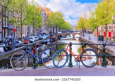 Amsterdam, Netherlands. Bicycles on a bridge early morning. - Powered by Shutterstock