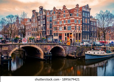 Amsterdam Netherlands canals with lights during evening in December during wintertime in the Netherlands Amsterdam city. Europe