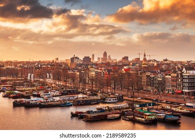 Amsterdam, Netherlands City Skyline On The North Sea Canal At Dusk.