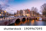 Amsterdam Netherlands during sunset, historical canals during sunset hours. Dutch historical canals in Amsterdam