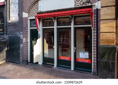 Amsterdam, Netherlands - January 15 2019: Window brothels in the De Wallen Red Light District of Amsterdam.