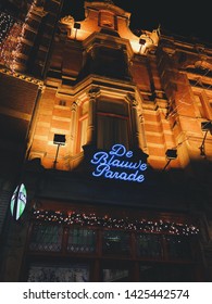 AMSTERDAM, NETHERLANDS - JANUARY 3, 2019: Blue Neon Sign Of The Amsterdam Bar 