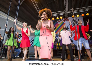 Amsterdam, the Netherlands - July 23, 2016: ZO gospel choir performing at the open air theater in Vondelpark for the Euro Pride Pink Saturday celebrations