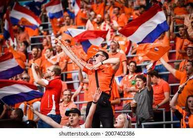 AMSTERDAM, Netherlands - JUNE 17, 2021: European Football Championship UEFA EURO 2020. Dutch Fans In Orange Support The Team At The Stadium During The Netherlands Vs Austria Match, Netherlands