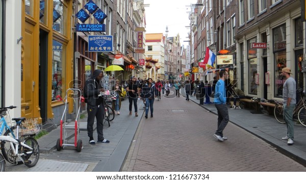 Amsterdam / Netherlands - June 2016: Street\
scene in Amsterdam, The\
Netherlands.