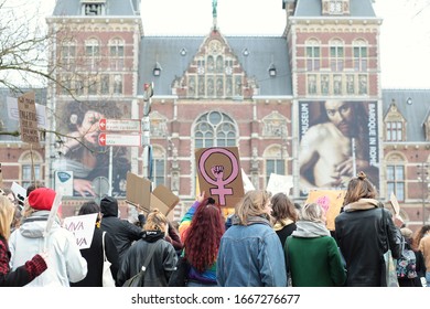 Amsterdam / Netherlands - March 8 2020: Women's March And Feminist Symbols With Rijksmuseum Background