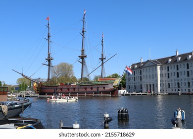 Amsterdam, The Netherlands - May 2022: National Maritime Museum With Replica Of 18th Century VOC Ship In Amsterdam