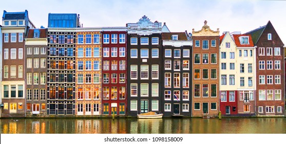 Amsterdam, The Netherlands, May 4th 2017:  Row of authentic canal houses on the Rokin in Amsterdam
