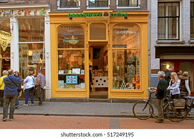 AMSTERDAM, NETHERLANDS - MAY 5, 2016: Coffeeshop Exterior In The Street Of Amsterdam, Netherlands