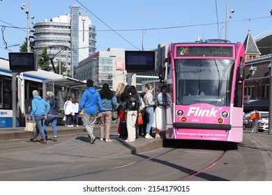 Amsterdam, Netherlands- May 8, 2022: tram Flink at Central Station Amsterdam, Netherlands
