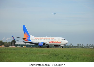 Amsterdam The Netherlands - May,11th 2015:  

G-GDFO Jet2 Boeing 737-300 

On The Polderbaan Runway Of Amsterdam Schiphol Airport. Jet2.com Limited Is A British Low-cost Airline In The United Kingdom.