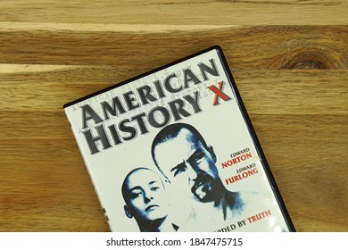 Amsterdam, The Netherlands - November 1, 2020: DVD Cover Of American History X Against A Wooden Background.