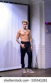 AMSTERDAM, NETHERLANDS - OCT 26, 2016: Justin Drew Bieber, a Canadian singer and songwriter, Madame Tussauds wax museum in Amsterdam. One of the popular touristic attractions
