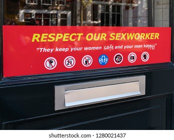 Amsterdam, Netherlands - October 15 2018: A sign in a red light district window requests that visitors respect sexworkers.