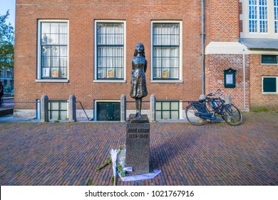 Amsterdam, Netherlands - October 7, 2017: Statue Of Anne Frank By Pieter D'Hont, Next To Anne Frank Huis.