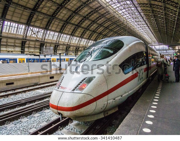 AMSTERDAM, NETHERLANDS - SEP 2: ICE trains at\
Amsterdam Centraal Station in Netherlands on September 2, 2013. ICE\
is a system of high-speed trains running in Germany and its\
surrounding\
countries.