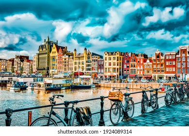 AMSTERDAM, NETHERLANDS - SEPTEMBER 15, 2015: Beautiful views of the streets, ancient buildings, people, embankments of Amsterdam - also call "Venice in the North". Netherland