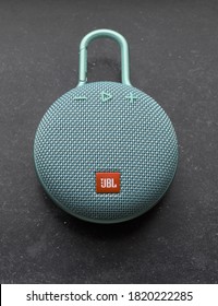 AMSTERDAM, NETHERLANDS - SEPTEMBER 2020: Light Blue JBL Clip 2 That Is To Play Music At A Loud Volume. A Product That Uses Bluetooth. Digital Concept For Music And Audio. A Mini, Good For On The Go.