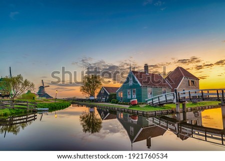 Amsterdam Netherlands, Sunrise landscape of Dutch Windmill and traditional house at Zaanse Schans Village
