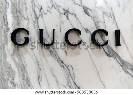 Amsterdam, Netherlands-february 19, 2017: Letters Gucci on a marble wall