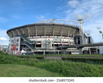 Amsterdam, North Holland, Netherlands- May 21, 2022: Facade of Johan Cruijff Arena. It is Amsterdam Ajax  football, soccer club home games stadium. Panoramic view of the stadium.
