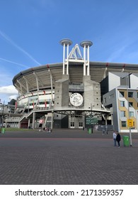 Amsterdam, North Holland, Netherlands- May 21, 2022: Facade of Johan Cruijff Arena. It is Amsterdam Ajax home games stadium. Football, soccer club logo. Main, front entrance.