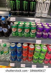 Amsterdam, North Holland / Netherlands - November 1, 2020: Soft Soda Drink Cans On Shelves/display At Convenience Store. Cherry, Pineapple, Berrry Flavoured Fanta, Monster, Sprite, Canada Dry, Welch's