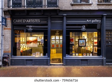 Amsterdam, November 2017. Outside View Of A Small Art Gallery With Paintings And Prints