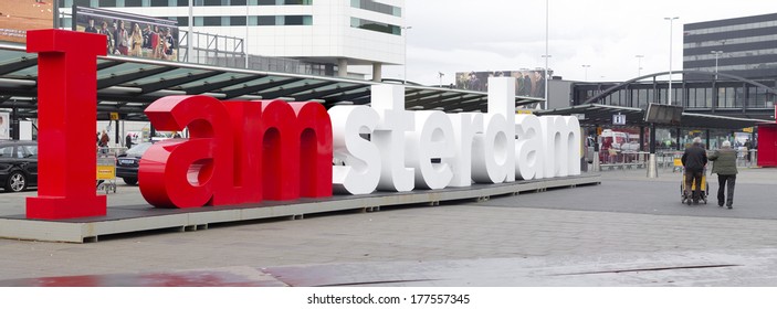 AMSTERDAM - NOVEMBER 28, 2013: The famous logo IAmsterdam in front of Schiphol airport. AMS is the Netherlands' main international airport, located southwest of Amsterdam.