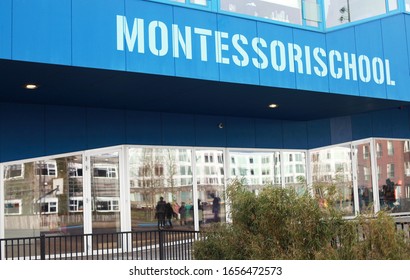 Amsterdam, Steigereiland / Netherlands - February 25 2020: Facade Of Blue Building Of Montessori School