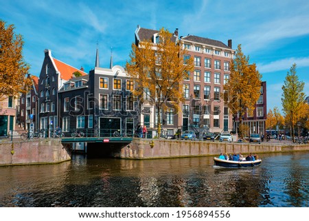 Similar – Schöne Architektur niederländischer Häuser und Hausboote am Amsterdamer Kanal im Herbst