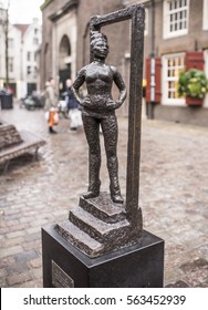   Amsterdam,Netherlands-December 30,2016: Monument Wayward Prostitutes Is Set Next To The Oude Kerk Church.This Composition Is The First And Only In The World Officially Recognized Monument Prostitute