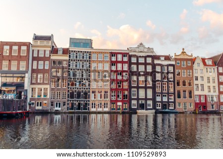 Similar – Image, Stock Photo Tranquil Amsterdam canal with iconic narrow houses