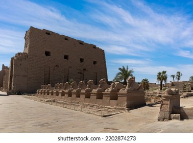  The Façade Of The Amun Re Precinct With Avenue Avenue Of The Sphinxes And First Pylon At The Entrance Of Karnak Temple At Luxor . Egypt .