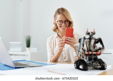 Amused Woman Having Fun In The Office