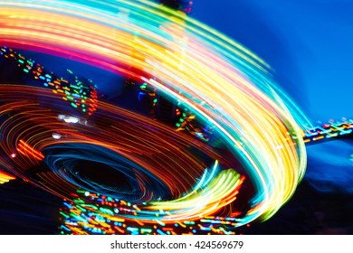 amusement lights on background night sky - Powered by Shutterstock