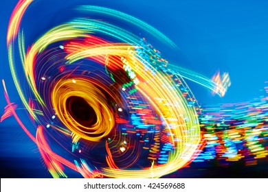 amusement lights on background night sky - Powered by Shutterstock