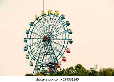 Amusement park ferris wheel in the sky