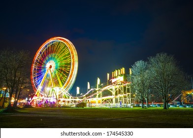 Amusement Park At Night - Ferris Wheel  In Motion
