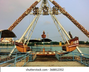 Amusement park pirate ship ride abandoned and decaying - landscape photo - Powered by Shutterstock