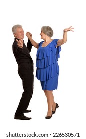 Amusing Old Couple Dancing On A White Background