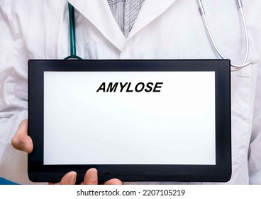 Amylose.  Doctor With Rare Or Orphan Disease Text On Tablet Screen Amylose